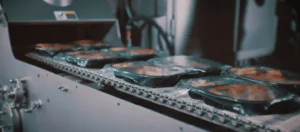 CPET trays with product going into a Marlen Spiral Oven image