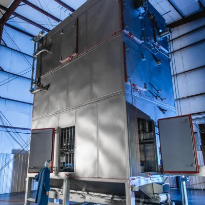 Marlen Vertical Cruster with an employee standing beside it